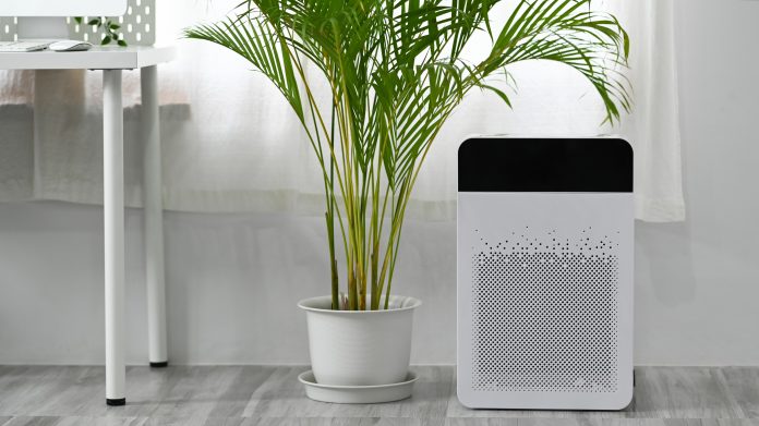 Air purifier in a bright clinical-style room