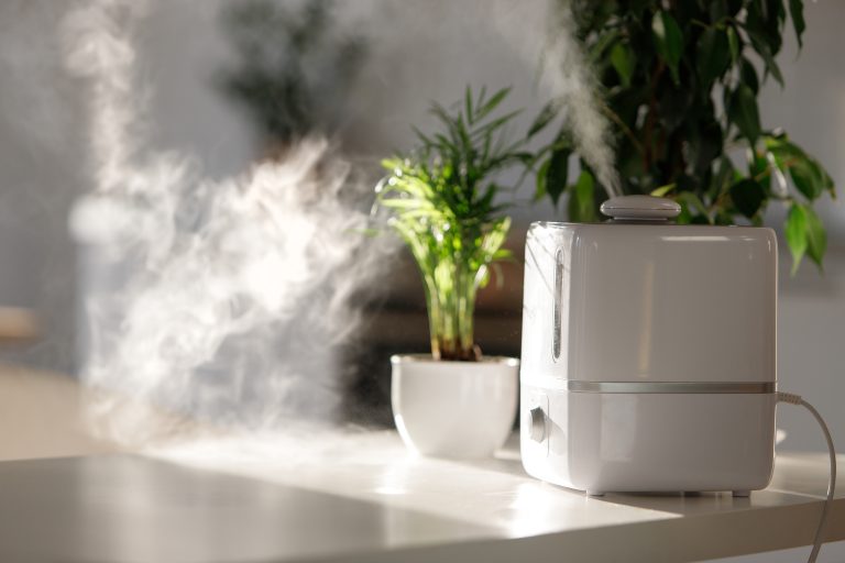 Close-up of a cool-mist humidifier on a table at home