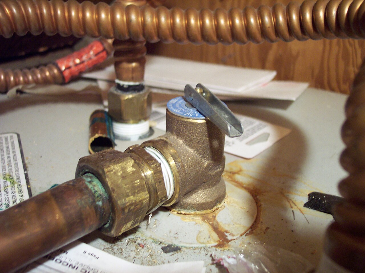 water heater temperature pressure relief valve Temperature and pressure relief valve on top of a water heater tank